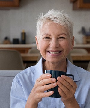 Woman smiling on a couch
