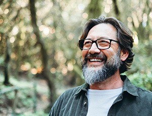 Man smiling outside