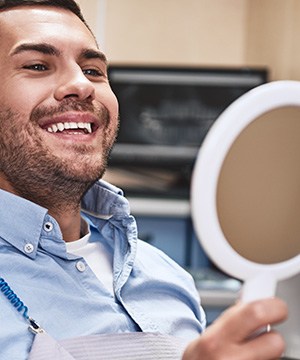 Man smiling in the dental chair