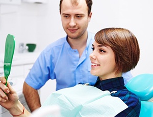 Young female patient pleased with her new smile
