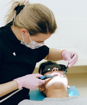 Man at dentist for routine dental care.