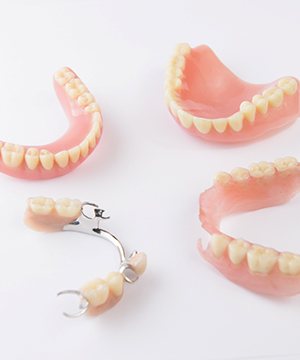 Closeup of different types of dentures in Virginia Beach