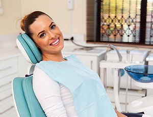 Female patient smiling in a dentist’s office