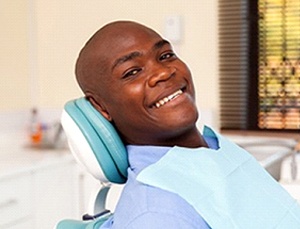 patient smiling in the dental chair