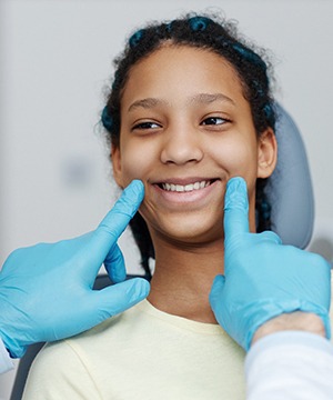 Teen in Virginia Beach smiling after wisdom tooth extraction 