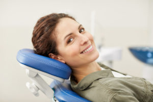 Young woman smiling at dentist in Virginia Beach